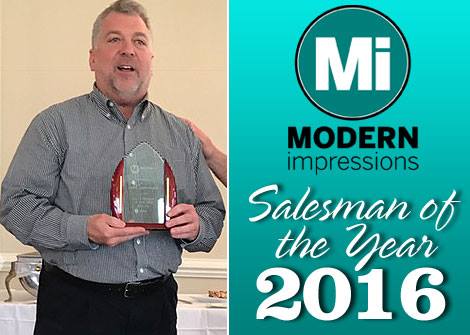 Photo of Scott with his award.